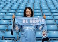 4th May 2024; Etihad Stadium, Manchester, England; Premier League Football, Manchester City versus Wolverhampton Wanderers; a Manchester City supporter poses with her match scarf