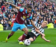 4th May 2024; Turf Moor, Burnley, Lancashire, England; Premier League Football, Burnley versus Newcastle United; Lewis Hall of Newcastle tackles Lorenz Assignon of