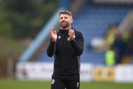 4th May 2024; Dens Park, Dundee, Scotland; Scottish Premiership Football, Dundee versus St Mirren; St Mirren manager Stephen Robinson applauds the fans at the end of the match