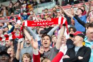 4th May 2024; Gtech Community Stadium, Brentford, London, England; Premier League Football, Brentford versus Fulham; Brentford fans raise their scarves in support of the