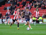 4th May 2024; Bramall Lane, Sheffield, England; Premier League Football, Sheffield United versus Nottingham Forest; Morgan Gibbs-White of Nottingham Forest runs with the ball under pressure from Oliver Arblaster of Sheffield