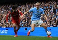 4th May 2024; Etihad Stadium, Manchester, England; Premier League Football, Manchester City versus Wolverhampton Wanderers; Erling Haaland of Manchester City holds off a challenge from Ryan Ait-Nouri of Wolverhampton