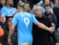 4th May 2024; Etihad Stadium, Manchester, England; Premier League Football, Manchester City versus Wolverhampton Wanderers; Manchester City manager Pep Guardiola congratulates Erling Haaland as he is substituted but Haaland shows his frustration at being taken