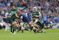 4th May 2024; Croke Park, Dublin, Ireland; Investec Champions Cup Rugby, Leinster versus Northampton Saints; Josh van der Flier of Leinster is tackled by George Furbank and Alex Mitchell of Northampton
