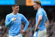 4th May 2024; Etihad Stadium, Manchester, England; Premier League Football, Manchester City versus Wolverhampton Wanderers; Phil Foden of Manchester City speaks with team mate Kevin de Bruyne before a free