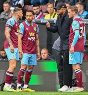 4th May 2024; Turf Moor, Burnley, Lancashire, England; Premier League Football, Burnley versus Newcastle United; Manager of Burnley Vincent Kompany gives instructions to Josh Brownhill , Vitinho and Jacob Bruun Larsen of Burnley during a break in play