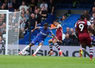 5th May 2024; Stamford Bridge, Chelsea, London, England: Premier League Football, Chelsea versus West Ham United; Noni Madueke of Chelsea challenged by Emerson Palmieri of West Ham