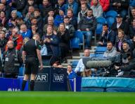 5th May 2024; Ibrox Stadium, Glasgow, Scotland; Scottish Premiership Football, Rangers versus Kilmarnock; Referee David Dickinson checks the VAR screen for a possible