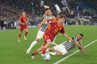 5th May 2024, Stadio Olimpico, Rome, Italy; Serie A Football; Roma versus Juventus; Tommaso Baldanzi of AS Roma tackled by Danilo of FC