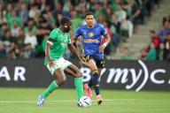 10th May 2024; Stade Geoffroy Guichard, Saint-Etienne, France; French League 2 football, AS Saint-Etienne versus Rodez; NADEÂ Mickael plays the ball as he is pressured by HOUNTONDJI Andreas of