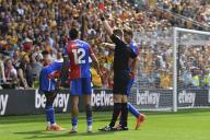 11th May 2024; Molineux Stadium, Wolverhampton, West Midlands, England; Premier League Football, Wolverhampton Wanderers versus Crystal Palace; Referee Tom Bramall issues a red card to Naouirou Ahamada of Crystal Palace for a second yellow card following a bad foul on Matheus Cunha of