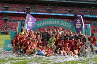 12th May 2024; Wembley Stadium, London, England; Womens FA Cup Final Football, Manchester United versus Tottenham Hotspur; Manchester United players group photo with the Adobe Women\'s FA Cup winner trophy