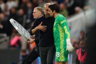 14th May 2024; Tottenham Hotspur Stadium, London, England; Premier League Football, Tottenham Hotspur versus Manchester City; Manchester City Manager Pep Guardiola gives instructions to goalieStefan Ortega before he comes on as a substitute for the injured
