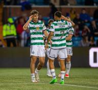 15th May 2024; Rugby Park, Kilmarnock, Scotland: Scottish Premiership Football, Kilmarnock versus Celtic; Matt ORiley of Celtic celebrates with Luis Palma of Celtic after he shoots and scores in the 71st minute to make it 5-0 to