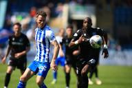 18th May 2024; Dens Park, Dundee, Scotland: Scottish Premiership Football, Dundee versus Kilmarnock; Andrew Miller of Kilmarnock challenges Mohamad Sylla of Dundee