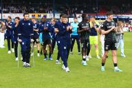 18th May 2024; Dens Park, Dundee, Scotland: Scottish Premiership Football, Dundee versus Kilmarnock; Dundee players included the injured Joe Shaughnessy and Liverpool loanee Owen Beck applaud the fans at the end of the match