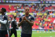 18th May 2024; Wembley Stadium, London, England; EFL League One Play Off Football Final, Bolton Wanderers versus Oxford United; Josh Dacres-Cogley of Bolton Wanderers applauding the fans during warm up ahead of kick-off