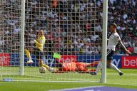 18th May 2024; Wembley Stadium, London, England; EFL League One Play Off Football Final, Bolton Wanderers versus Oxford United; Josh Murphy of Oxford United goes around goalkeeper Nathan Baxter of Bolton Wanderers to score in the 42nd minute for 0-2