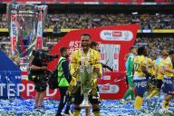 18th May 2024; Wembley Stadium, London, England; EFL League One Play Off Football Final, Bolton Wanderers versus Oxford United; Josh Murphy of Oxford United with the Sky Bet League One Play-off winner trophy