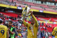 18th May 2024; Wembley Stadium, London, England; EFL League One Play Off Football Final, Bolton Wanderers versus Oxford United; Marcus McGuane of Oxford United celebrates with the Sky Bet League One Play-off winner trophy