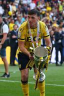 18th May 2024; Wembley Stadium, London, England; EFL League One Play Off Football Final, Bolton Wanderers versus Oxford United; Mark Harris of Oxford United celebrates with the Sky Bet League One Play-off winner trophy