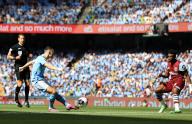 19th May 2024; Etihad Stadium, Manchester, England; Premier League Football, Manchester City versus West Ham United; Phil Foden of Manchester City shoots and scores for 1-0 after 2 minutes for 1-0