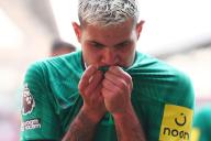 19th May 2024; Gtech Community Stadium, Brentford, London, England; Premier League Football, Brentford versus Newcastle United; Bruno Guimaraes of Newcastle United celebrates by kissing the badge after he scores for 2-4 in the 77th