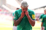 19th May 2024; Gtech Community Stadium, Brentford, London, England; Premier League Football, Brentford versus Newcastle United; Bruno Guimaraes of Newcastle United celebrates by kissing the badge after he scores for 2-4 in the 77th