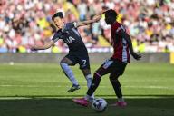 19th May 2024; Bramall Lane, Sheffield, England; Premier League Football, Sheffield United versus Tottenham Hotspur; Son Heung-min of Spurs plays a pass through the legs of Andre Brooks of