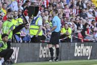 19th May 2024; Bramall Lane, Sheffield, England; Premier League Football, Sheffield United versus Tottenham Hotspur; Referee Andy Madley looks at the replays after issuing a red card to Andre Brooks of