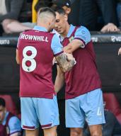 19th May 2024; Turf Moor, Burnley, Lancashire, England; Premier League Football, Burnley versus Nottingham Forest; Josh Brownhill gives Jack Cork of Burnley the Captainâs arm band for his last match at Burnley