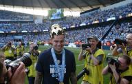 19th May 2024; Etihad Stadium, Manchester, England; Premier League Football, Manchester City versus West Ham United; Manchester City goalkeeper Ederson with the crown of the Premier League trophy on his head during the lap of honour