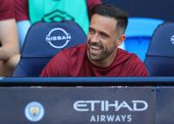 19th May 2024; Etihad Stadium, Manchester, England; Premier League Football, Manchester City versus West Ham United; Danny Ings of West Ham United smiles as he takes his seat on the substitutes bench