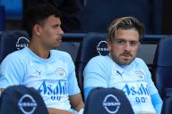 19th May 2024; Etihad Stadium, Manchester, England; Premier League Football, Manchester City versus West Ham United; Jack Grealish of Manchester City looks on from the substitutes