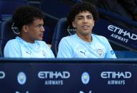 19th May 2024; Etihad Stadium, Manchester, England; Premier League Football, Manchester City versus West Ham United; Rico Lewis of Manchester City looks on from the substitutes