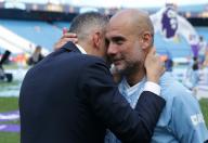 19th May 2024; Etihad Stadium, Manchester, England; Premier League Football, Manchester City versus West Ham United; Manchester City CEO Khaldoon Al Mubarak speaks to Manchester City manager Pep Guardiola after the lap of