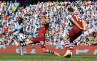 19th May 2024; Etihad Stadium, Manchester, England; Premier League Football, Manchester City versus West Ham United; Jeremy Doku of Manchester City shoots at goal as Tomas Soucek of West Ham United attempts to