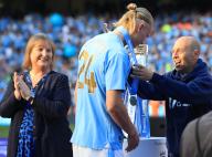 19th May 2024; Etihad Stadium, Manchester, England; Premier League Football, Manchester City versus West Ham United; Erling Haaland of Manchester City is presented with his medal