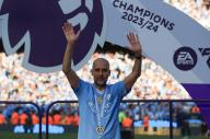 19th May 2024; Etihad Stadium, Manchester, England; Premier League Football, Manchester City versus West Ham United; Manchester City manager Pep Guardiola is presented with his Premier League winners