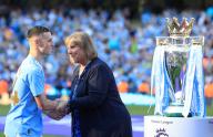 19th May 2024; Etihad Stadium, Manchester, England; Premier League Football, Manchester City versus West Ham United; Phil Foden of Manchester City is presented with his Premier League medal