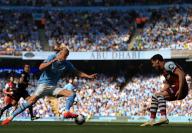 19th May 2024; Etihad Stadium, Manchester, England; Premier League Football, Manchester City versus West Ham United; Erling Haaland of Manchester City takes on Konstantinos Mavropanos of West Ham