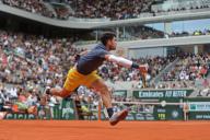 2nd June 2024; Roland Garros, Paris, France; 2024 French Open Tennis tournament, Day 8; Carlos Alcaraz stretches to return against Felix Auger