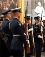 Washington, DC 2018/12/04 The changing of the Honor Guard as people pay their respects to President H.W. Bush in the rotunda of the United States Capitol. Photo by Dennis