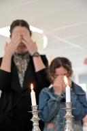 Jewish mother and daughter Candle-Lighting Blessings together for Sabbath and Holidays