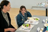 Jewish mother and daughter sitting on Seder table celebrate together Passover Jewish Holiday