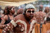 LAURA,QLD - JULY 08 2023:Indigenous Australians man on ceremonial dance in Laura Quinkan Dance Festival Cape York Australia. Ceremonies combine dance, song, rituals, body decorations and