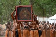 LAURA,QLD - JULY 08 2023:Indigenous Australians hold the winning prize of Laura Quinkan Dance Festival Cape York Australia. Ceremonies combine dance, song, rituals, body decorations and
