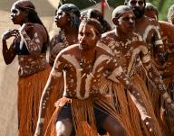 LAURA,QLD - JULY 08 2023:Indigenous Australians people on ceremonial dance in Laura Quinkan Dance Festival Cape York Australia. Ceremonies combine dance, song, rituals, body decorations and