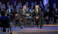 United States President Barack Obama shakes hands with CNN