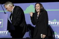 United States Vice President Kamala Harris, right, reacts at a campaign event for Terry McAuliffe, the Democratic Party nominee for Governor of Virginia, left, in Dumfries, Virginia on Thursday, October 21, 2021. Credit: Yuri Gripas / Pool via